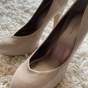 BCBGeneration tan pumps size 9